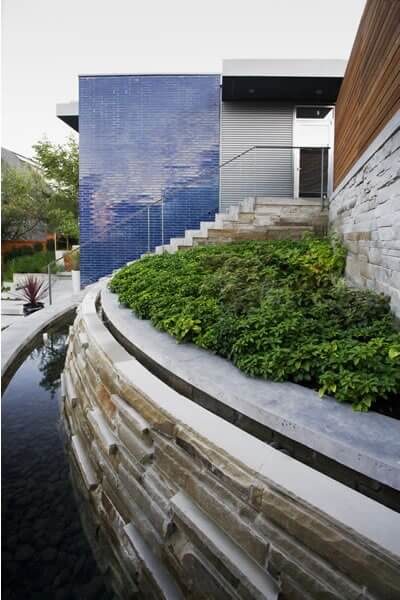 Exterior curved garden and water feature at the Langara residential build
